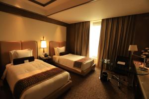 Postel nebo postele na pokoji v ubytování Crowne Plaza New Delhi Okhla by IHG