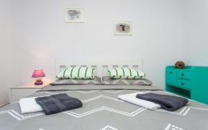 Łóżko lub łóżka w pokoju w obiekcie Studio TEA