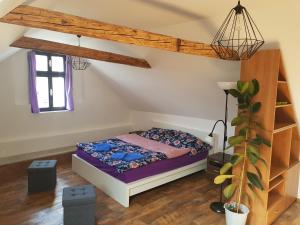 Posteľ alebo postele v izbe v ubytovaní Apartmany 123