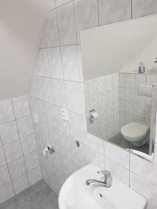 Kúpeľňa v ubytovaní Apartmany 123