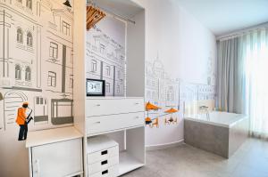 a childs room with a wall mural of buildings at Hotel Boutique Sabbia Valencia in Valencia