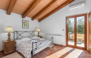Postel nebo postele na pokoji v ubytování Villa Maggie Vlakovo