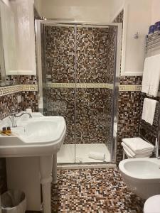 Koupelna v ubytování Hotel Aurelia