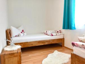 Letto o letti in una camera di Apart Waldblick