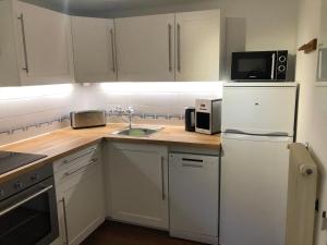 Kuchyň nebo kuchyňský kout v ubytování Ferienhaus Vera