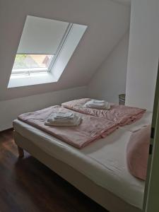 Voodi või voodid majutusasutuse Alte Bäckerei toas