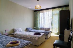 Katil atau katil-katil dalam bilik di Guest House Tommy Bansko - Bachevo
