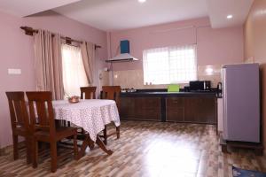 
A kitchen or kitchenette at Himalayan Sweet Apartment and Homestay
