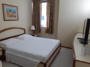 Postel nebo postele na pokoji v ubytování Hotel Sagres