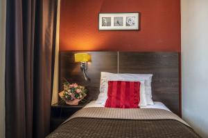 Posteľ alebo postele v izbe v ubytovaní Budapest Airport Hotel Stáció Wellness & Konferencia
