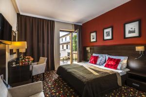 Posteľ alebo postele v izbe v ubytovaní Budapest Airport Hotel Stáció Wellness & Konferencia