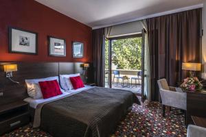 Posteľ alebo postele v izbe v ubytovaní Budapest Airport Hotel Stáció Wellness & Konferencia