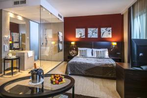 Posteľ alebo postele v izbe v ubytovaní Budapest Airport Hotel Stáció Wellness & Konferencia