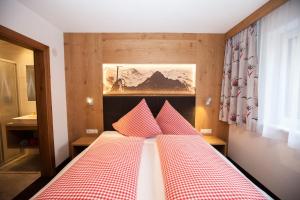 Postel nebo postele na pokoji v ubytování Haus Küchelspitz