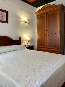 Postel nebo postele na pokoji v ubytování El Molino de La Quinta
