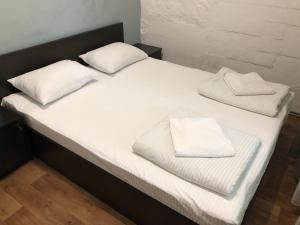 Postel nebo postele na pokoji v ubytování FOX Hostel