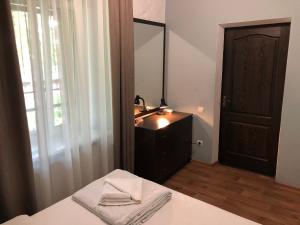 Postel nebo postele na pokoji v ubytování FOX Hostel