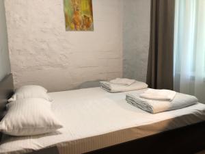 Postel nebo postele na pokoji v ubytování FOX Hostel