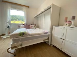 Postel nebo postele na pokoji v ubytování Traumhaus Flattnitz