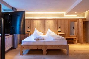 Krevet ili kreveti u jedinici u objektu Hotel Goldenes Roessl-adults only