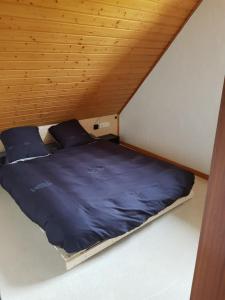 Letto o letti in una camera di Raidillon - gîte 5 chambres