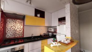 A kitchen or kitchenette at Pinda x Campos x Aparecida