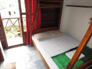 Postel nebo postele na pokoji v ubytování Esperanto Bed & Breakfast Surf Hostel
