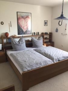 Postelja oz. postelje v sobi nastanitve Sonniges Haus-Wohnung mit Garten im Oberallgäu