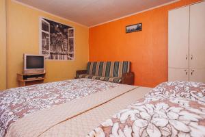 Postel nebo postele na pokoji v ubytování Apartmens Faraon On Illinskaya New Building 6 floor