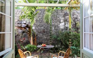Ein Garten an der Unterkunft Hotel Hacienda de Abajo-Adults Only-Lujo