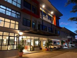 a building with a car parked in front of it at Kradang Nga Boutique Inn in Khun Han