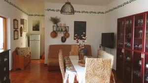 a dining room with a table and some chairs at Casa Blas in Puerto del Rosario