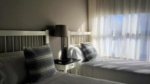 Posteľ alebo postele v izbe v ubytovaní MD Modern Hotel - Jardines
