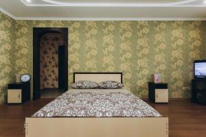 Ένα ή περισσότερα κρεβάτια σε δωμάτιο στο Apartments Faraon neer Manufaktura