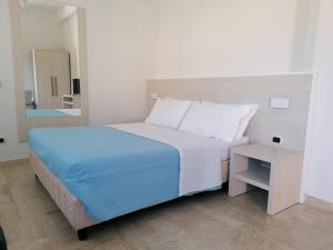 Posteľ alebo postele v izbe v ubytovaní Zibibbo Beach Apartments - Trapani