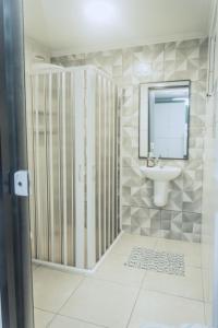 Vonios kambarys apgyvendinimo įstaigoje Bela Curitiba Hostel