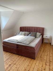 Postel nebo postele na pokoji v ubytování Ferienwohnungen Gartenstrasse