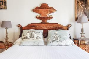 Ein Bett oder Betten in einem Zimmer der Unterkunft Hotel Hacienda de Abajo-Adults Only-Lujo
