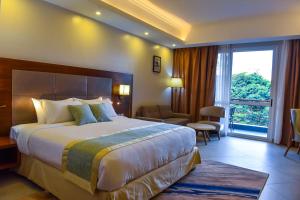 Voodi või voodid majutusasutuse Admas Grand Hotel toas +27 fotot