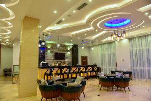 Restoran või mõni muu söögikoht majutusasutuses Admas Grand Hotel
