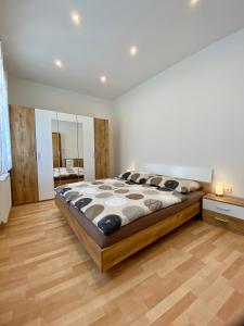 Postel nebo postele na pokoji v ubytování Apartment Claudia