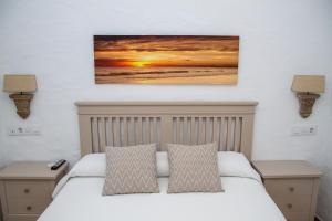 Postel nebo postele na pokoji v ubytování Hotel Almadraba