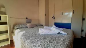 A bed or beds in a room at L'angolo di Betti