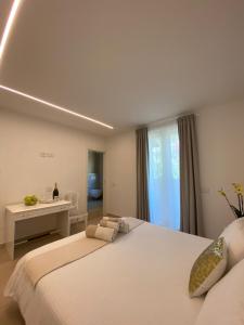 Posteľ alebo postele v izbe v ubytovaní B&B Am Gardasee blick