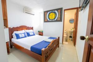 Postel nebo postele na pokoji v ubytování Hotel Aquarius