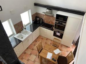 Kuchyň nebo kuchyňský kout v ubytování Villa Dornröschen Hofgeismar