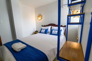Postel nebo postele na pokoji v ubytování Hotel Aquarius