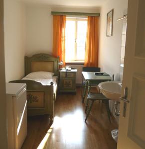 Fotografia z galérie ubytovania Hotel Schwarzes Rössl v destinácii Salzburg