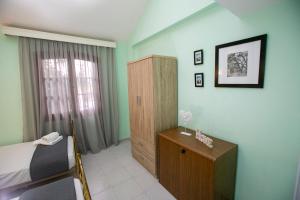 A bed or beds in a room at Villa Kouf