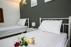 A bed or beds in a room at Villa Kouf